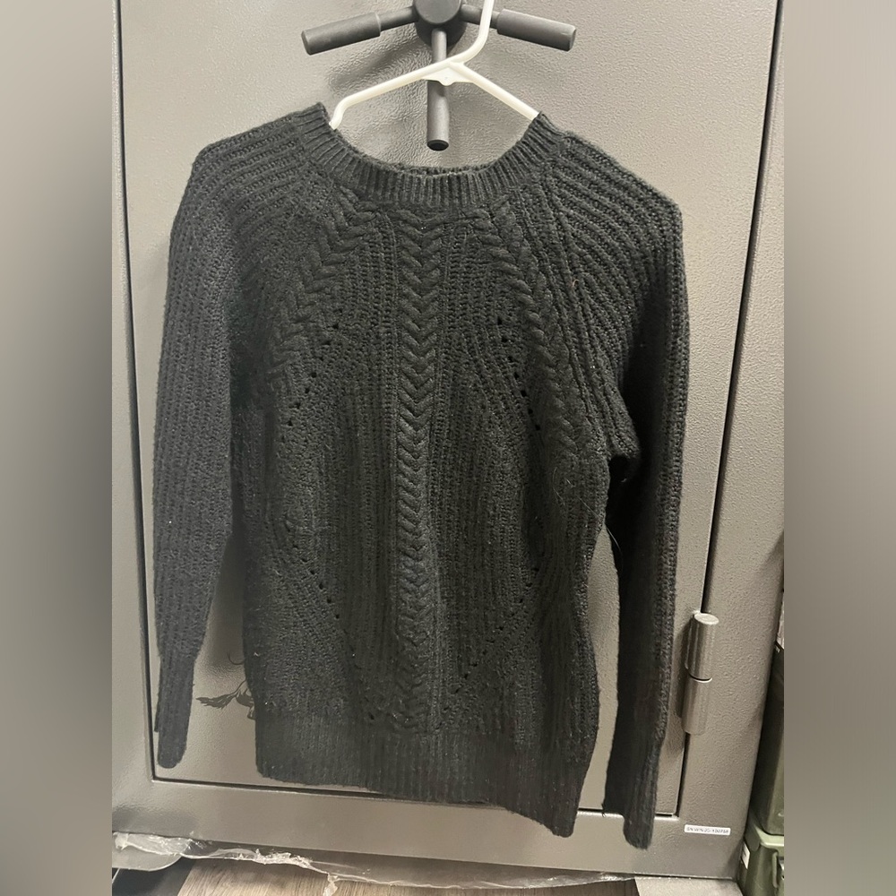 Women’s sweater.